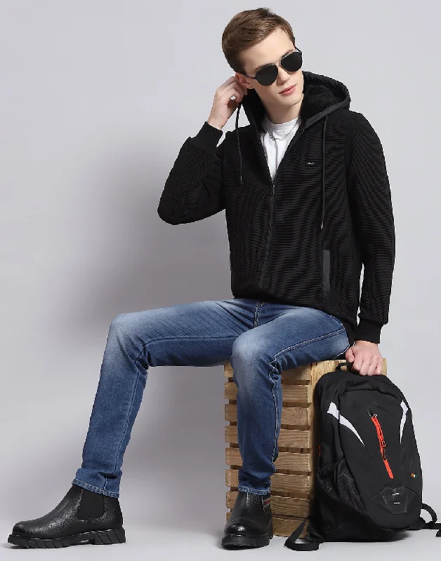 Men Black Solid Hooded Full Sleeve Sweatshirt